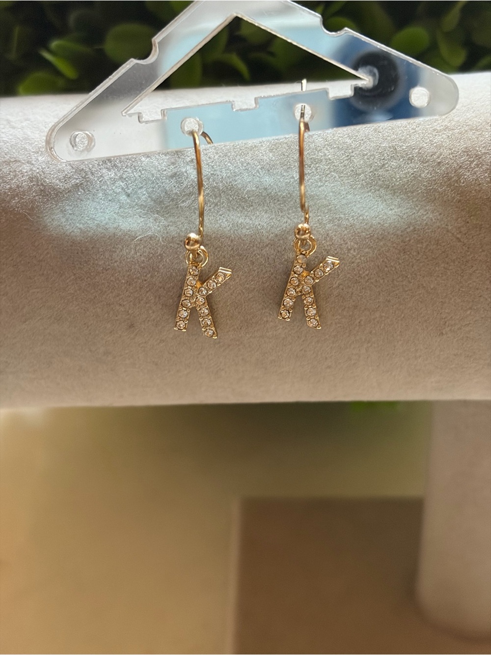 Gold tone K initial drop earrings